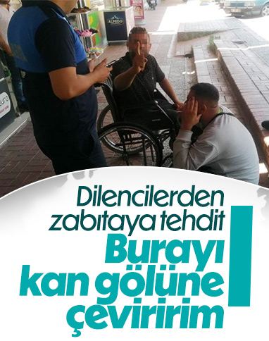 Antalya'da engelli taklidi yapan dilenciler, zabıtayı tehdit etti