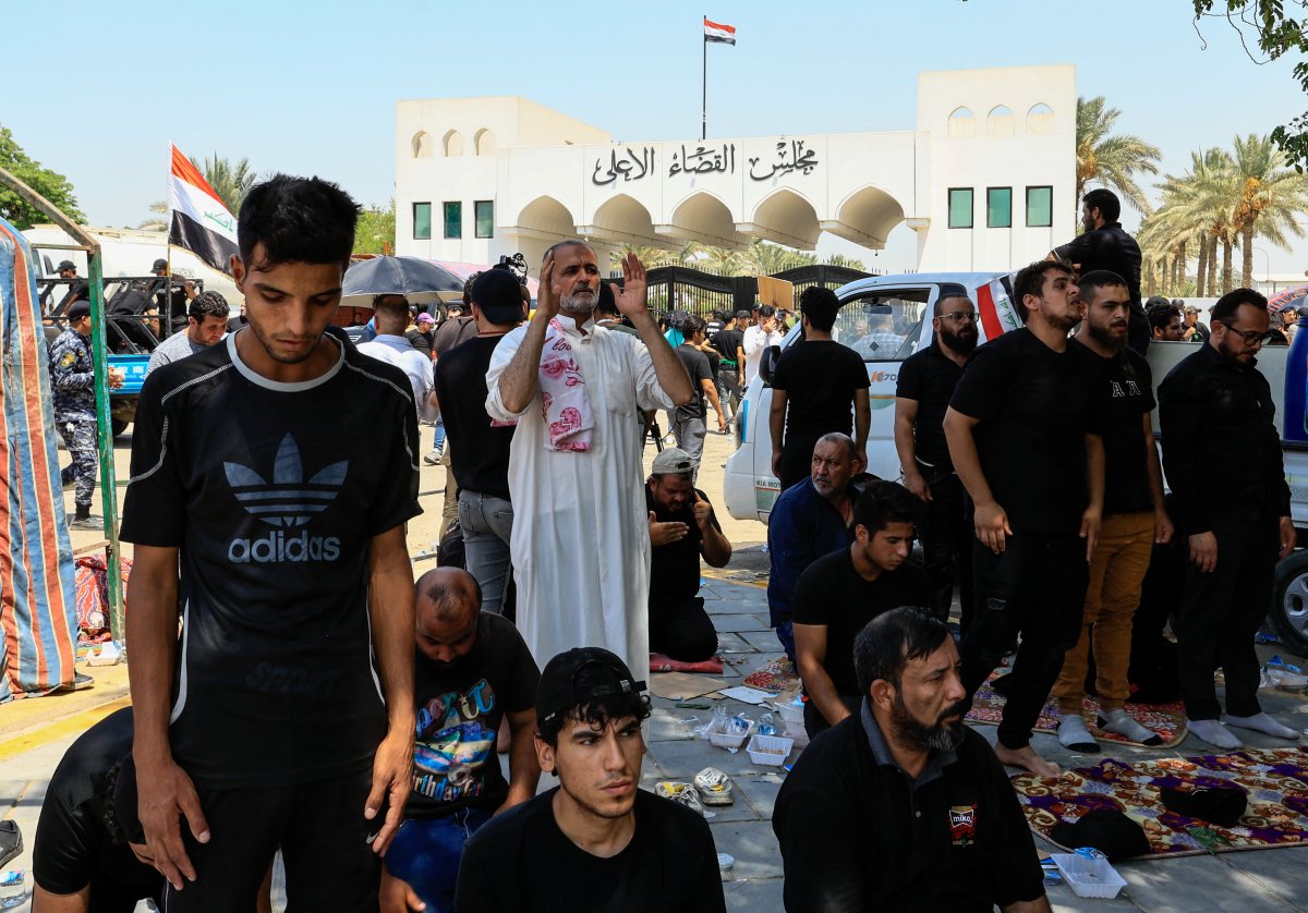 Sadr supporters set up tents in front of the Supreme Judicial Council in Iraq #6