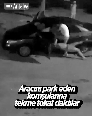 Antalya’da aracını park etmeye çalışan adama komşu dayağı