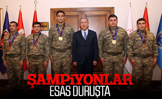 Hulusi Akar, madalya kazanan güreşçileri kabul etti