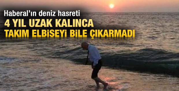 Mehmet Haberal elbiseleriyle denizde