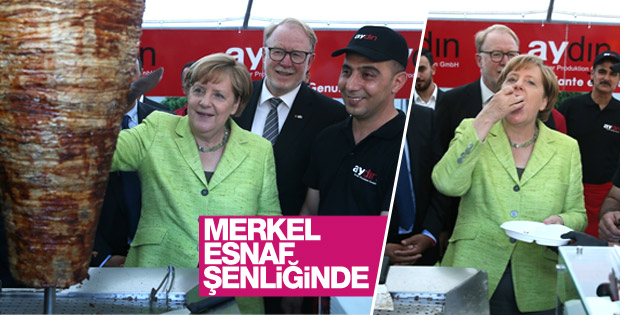 Merkel esnaf şenliğinde döner kesti