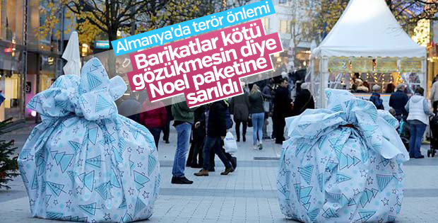 Almanya'da terör bariyerlerine hediye paketi kamuflajı