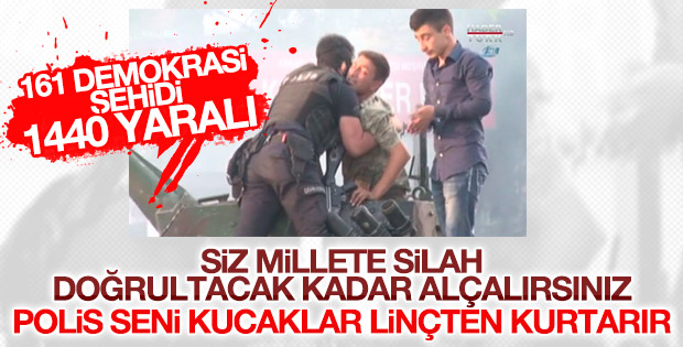 Polis darbeci askeri linçten kurtardı