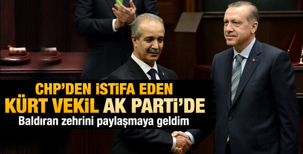 Erdoğan CHP'li Fırat'a rozet taktı