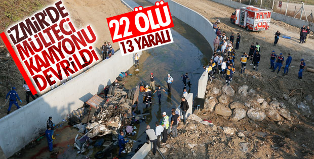 İzmir'de göçmenleri taşıyan kamyon devrildi