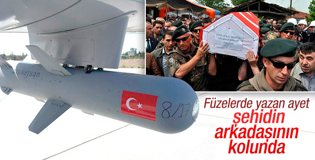 Şehidin silah arkadaşının kolunda yazan ayet