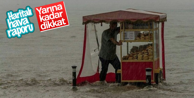 Selde kalınca ekmek teknesine sarılan simitçi