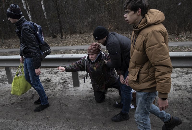 Çatışmaların arasında tahliye edilen Ukraynalıların kareleri