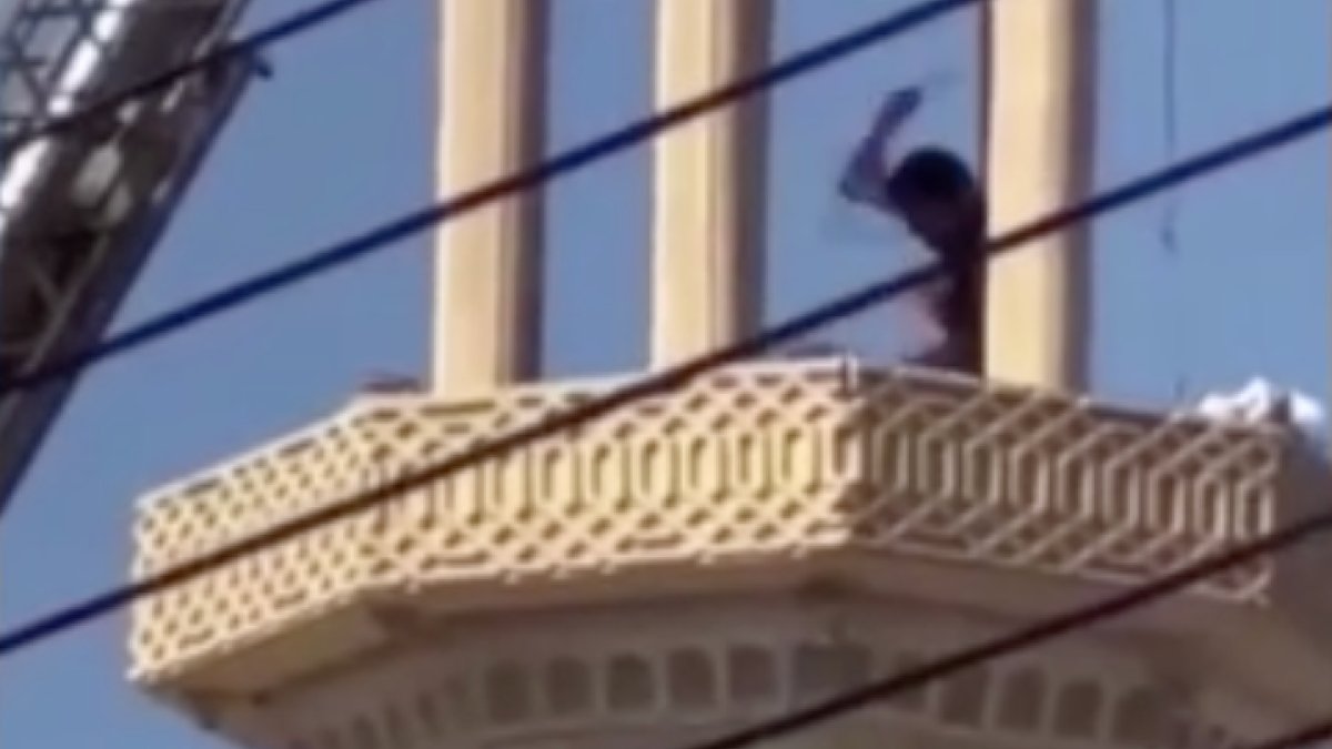 A man in Egypt was beaten on the minaret he climbed to commit suicide